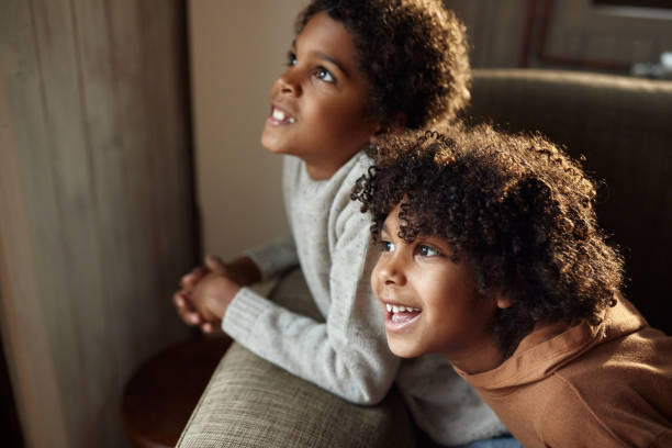 istock Happy black kids enjoying at home. 1466996423