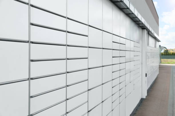istock Modern parcel locker with many postal boxes outdoors 1466997064