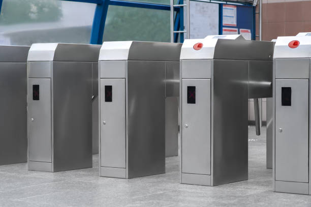 istock Many modern turnstiles outdoors. Fare collection system 1466997139