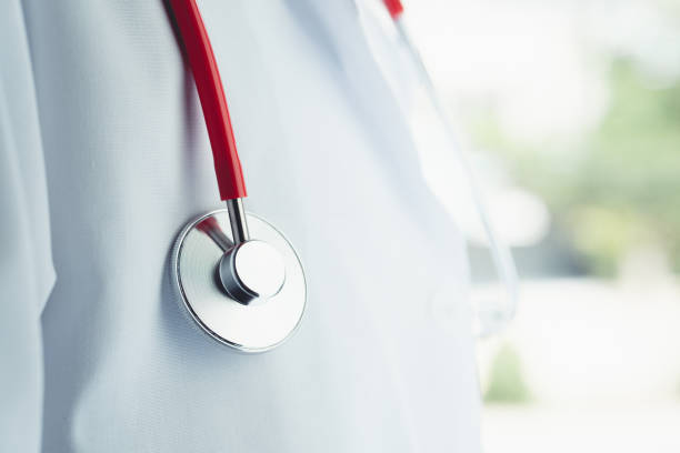 istock doctor, stethoscope attached to neck, copy-space, nonexistent, close-up. 1466998557