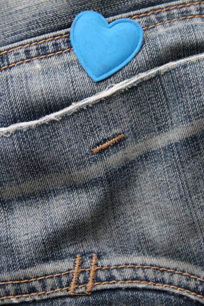 istock Blue heart on jeans. Birthday background. 1466999790