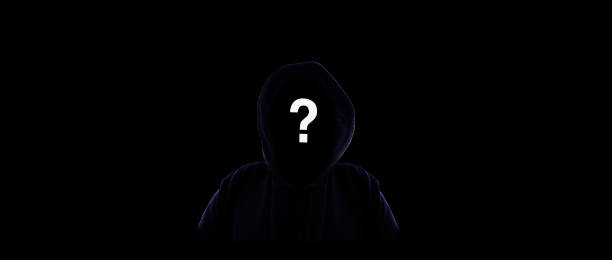 Dark person with hood silhouetted Dark person with hood silhouetted against dark background question mark people one person silhouette stock pictures, royalty-free photos & images