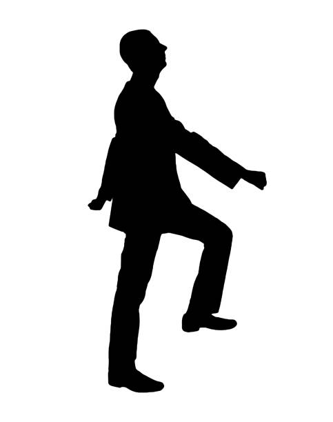 istock A silhouette of a man climbs the stairs. Business concept 1467000775
