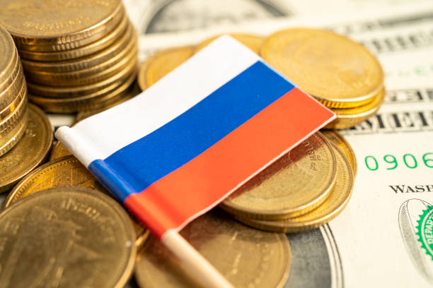 istock Stack of coins with Russia flag on white background. 1467001169