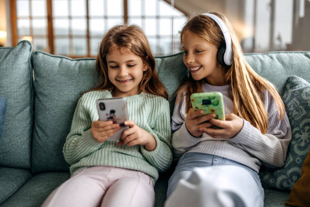 istock Digital natives using phones at home 1467007027
