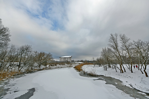 Winter urban landscape, rivers in the city center.