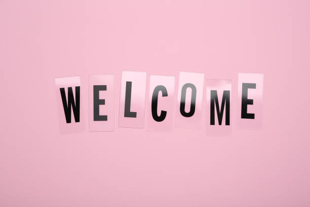 istock Word Welcome made of plastic letters on pink background, top view 1467010751
