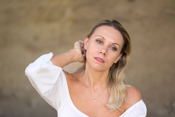 istock Woman runs a hand through her hair 1467018852