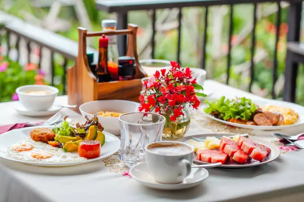 Photo of Bright morning food in summer garden terrace