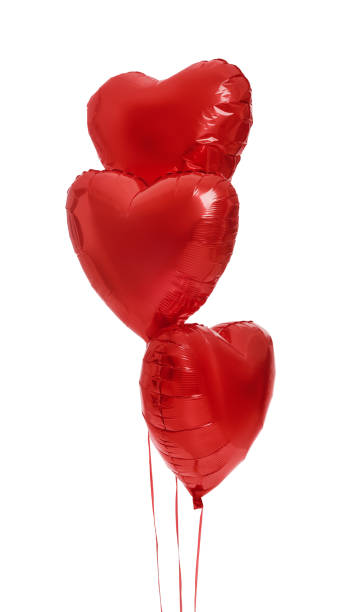 istock Beautiful red heart shaped balloons isolated on white. Valentine's day celebration 1467021032