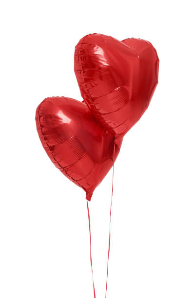 istock Beautiful red heart shaped balloons isolated on white. Valentine's day celebration 1467021037