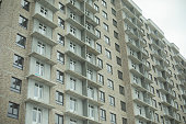 Building under construction. Windows in house.