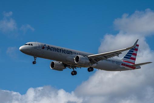 Miami, United States - February 16, 2023: American Airlines airplane (Airbus A321neo Sharklet) landing at Miami International Airport.