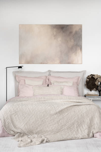 istock Beautiful bedroom in light colors with art 1467025065