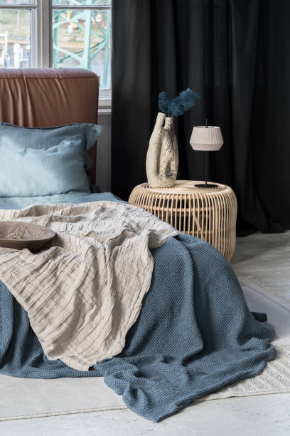istock Decorations on rattan bedside table in bedroom 1467025591