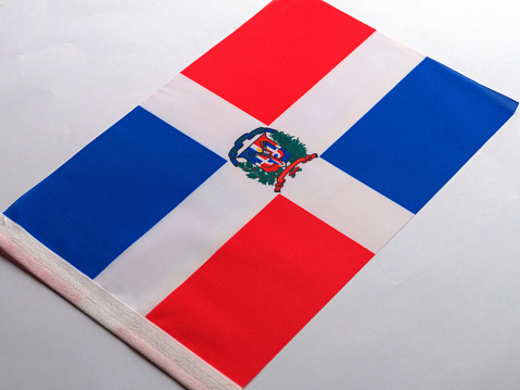 Small National Flag of the Dominican Republic on a Black Background. 3d Rendering