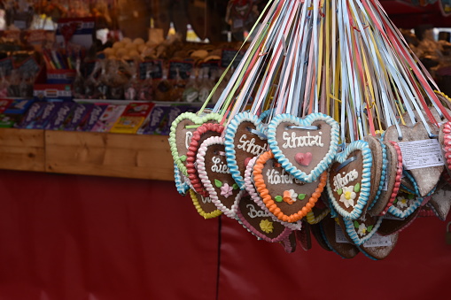 Traditional heart shaped gingerbread cookies, called lebkuchenherzen in German, for sale at Oktoberfest; more commonly kept for souvenirs than consumed.
