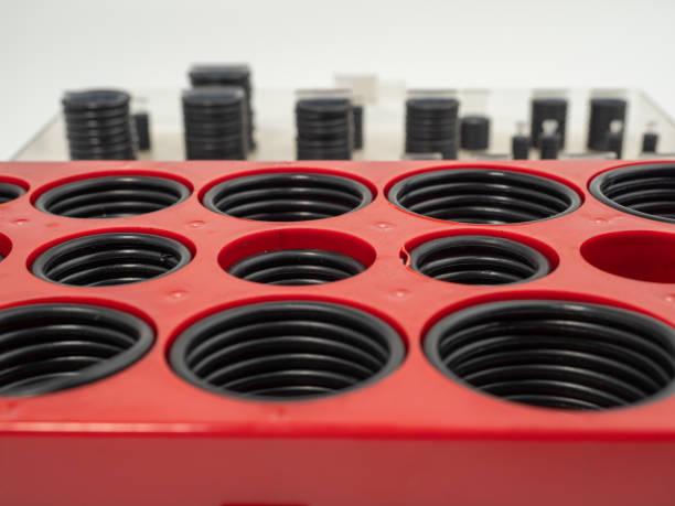 istock Hydraulic and pneumatic o-rings in black in different sizes on a white background. Rubber gaskets for plumbing. 1467030096