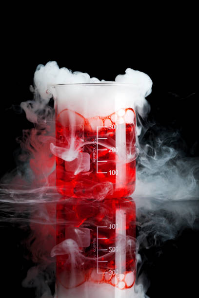 istock Chemical Beaker with red liquid and smoke 1467035413