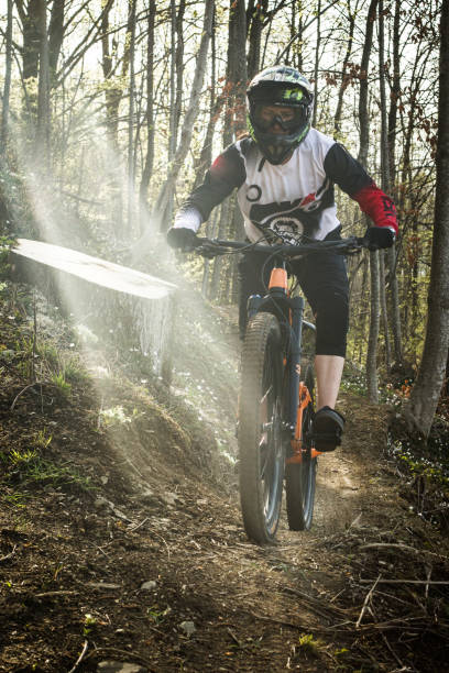 istock Young woman on a downhill bicycle 1467045434