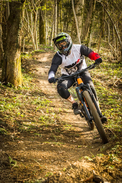 istock Young woman on a downhill bicycle 1467045440
