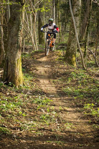 istock Young woman on downhill bicycle 1467045443