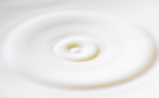 Close-up of splashing droplet of milk.