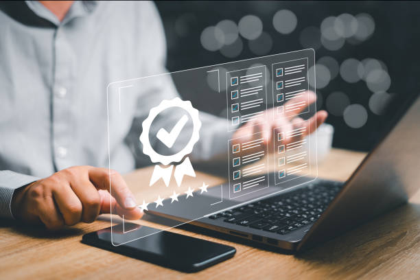 istock Customer Satisfaction Guarantee concept on virtual screens, Businessman check satisfaction ratings online documents checklist on smartphone to improve customer development and satisfaction of product 1467048657