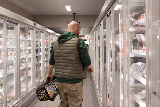 istock Man shopping in a supermarket 1467052190