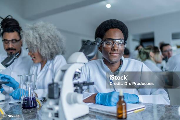 Taking Lab Notes College Student Taking Notes In The Lab Stock Photo - Download Image ...