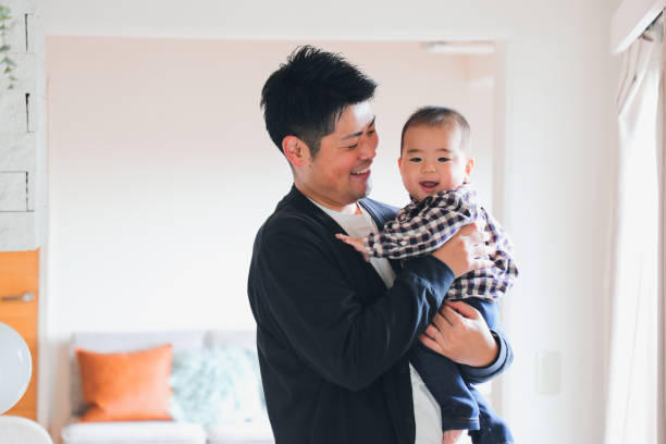 istock Asian Baby and Dad at home 1467053068