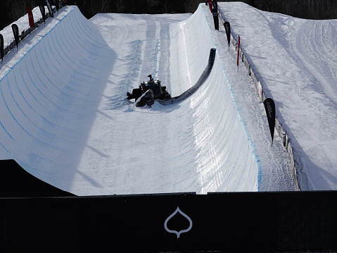 Grooming machine in the halfpipe at Buttermilk ski resort used for the Aspen X Games.