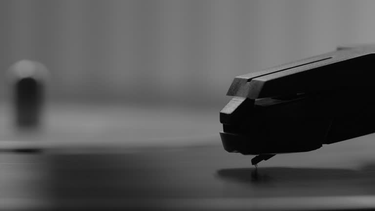 Vinyl record- turntable and Stylus. Close up black and white.