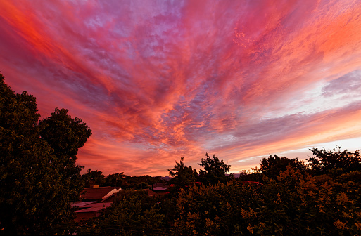 Beautiful red sunset clouds over Worcester, Western Cape, South Africa.
