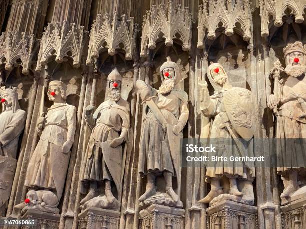 Ancient Statues With Red Carnival Noses Stock Photo - Download Image Now - Altstadt - Cologne, Ancient, Architecture