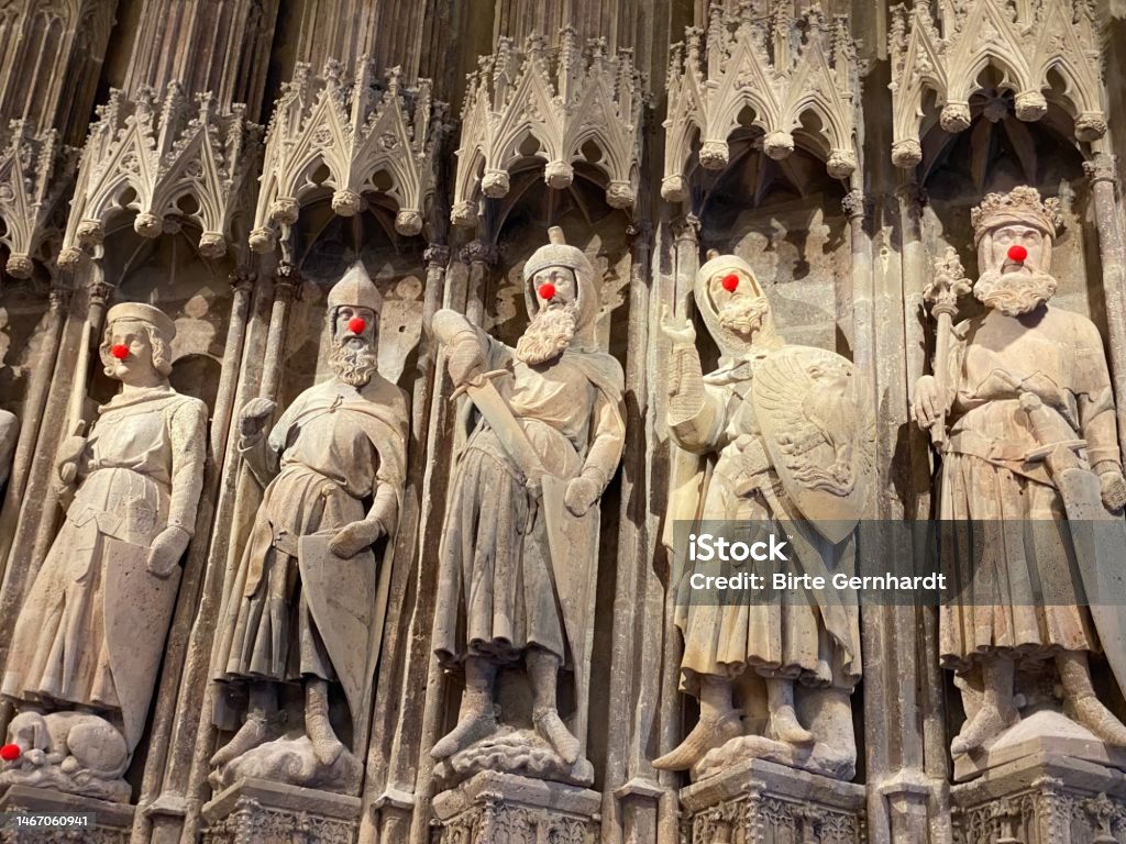 Ancient statues with red carnival noses Carnival - Celebration Event Stock Photo