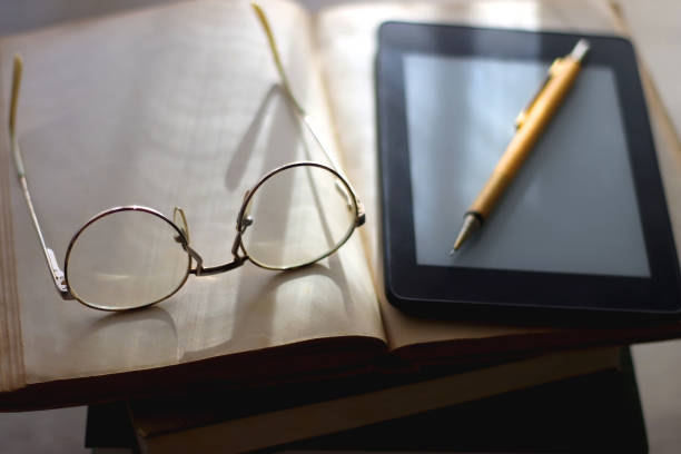 Books, Tablet, Glasses and Pen stock photo