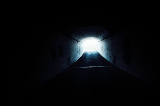 A long, dark, creepy tunnel.