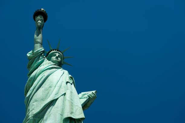 istock Statue of Liberty and blue skies 1467069831