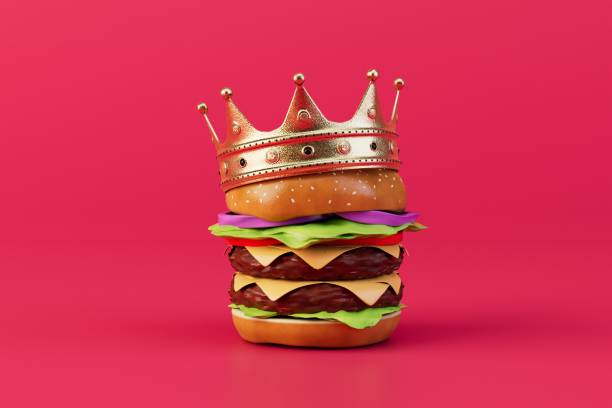 istock burger king. a large burger in a crown on a red background. 3D render 1467075234