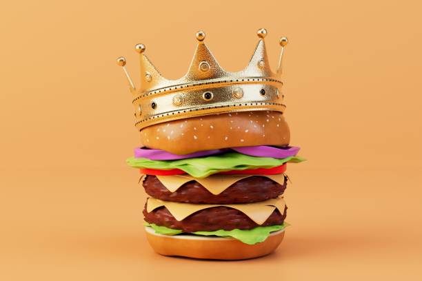 istock burger king. a large burger in a crown on a orange background. 3D render 1467075237