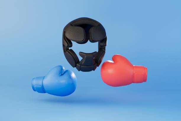 istock equipment for boxing. boxing gloves and a helmet on a blue background. 3D render 1467075631