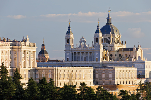 Madrid, Spain -  October 06, 2019: The front view of the Santa Maria la Real de La Almudena Cathedral with tourists are in front of the cathedral.