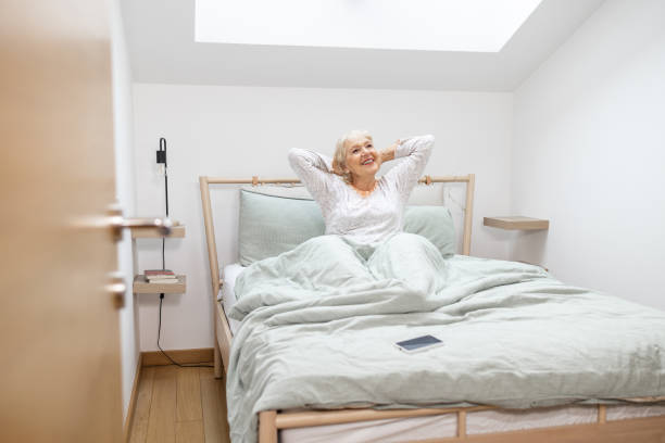 istock Senior woman waking up 1467081447