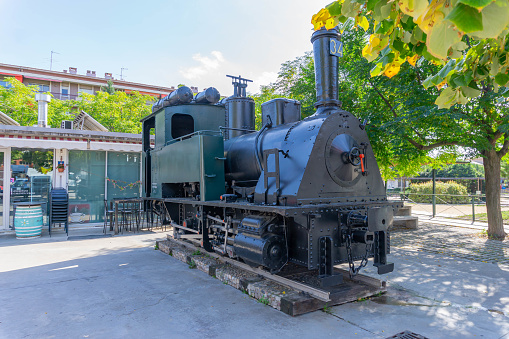Navás, Barcelona - October 16, 2022: closeup of a disused old locomotive at the bus station