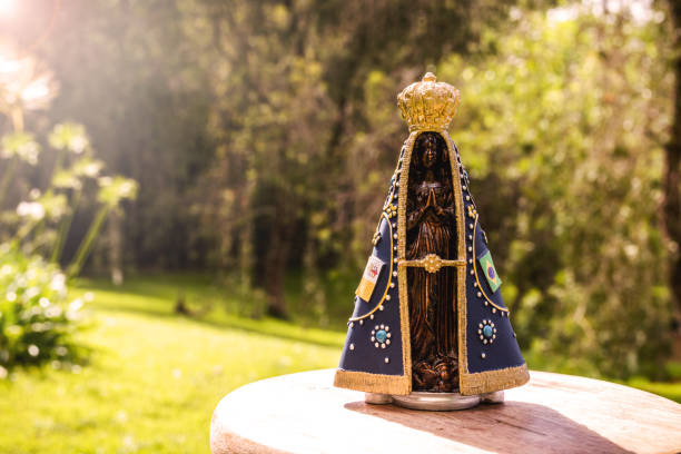 image of Our Lady of Aparecida, in a natural setting, space for text, copy space, catholic patron saint of brazil, christianity stock photo