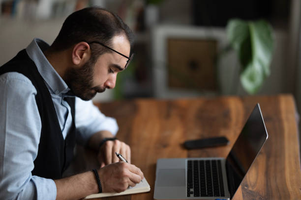 istock Businessman working from home office 1467088439