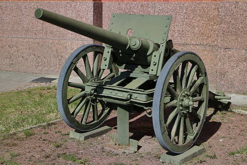 old infantry cannon on wooden wheels, artillery 19th century
