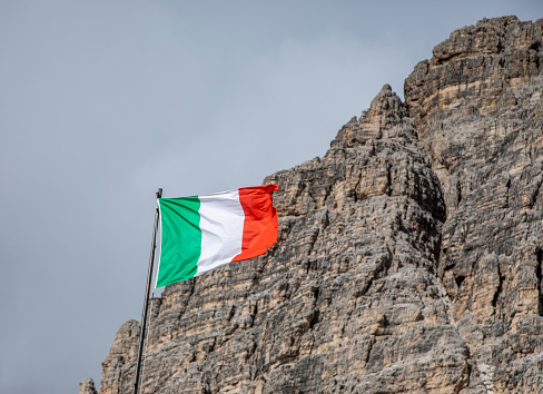 Italy flag is Dolomite peaks in early morning in Italian Tirol Alps, Dolomites, Italia