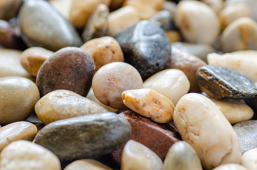 A colorful assortment of stones in a pile.